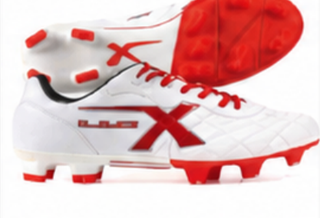 Football boot with blades